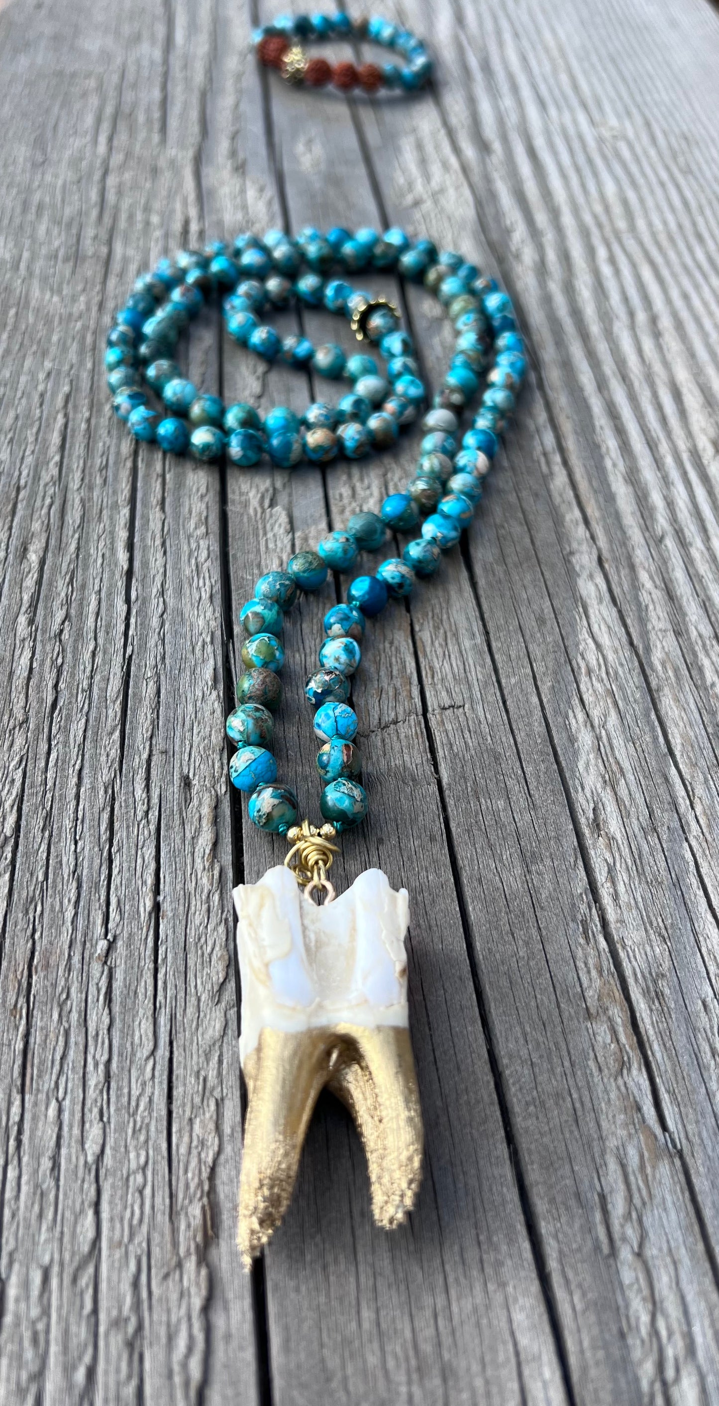 A-s-k and receive. Elk tooth pendant, brass wire, gold plated beads, jasper round beads, mala & bracelet. Elk tooth harvested from the forest after animal naturally died. Gratitude to the Earth for this exceptional life.