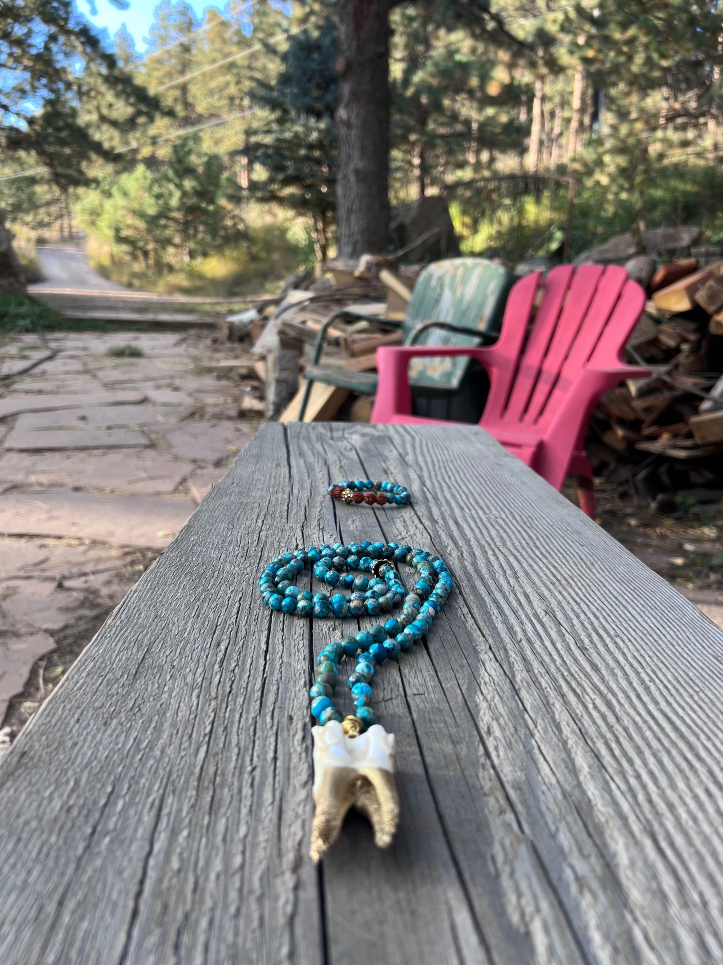 A-s-k and receive. Elk tooth pendant, brass wire, gold plated beads, jasper round beads, mala & bracelet. Elk tooth harvested from the forest after animal naturally died. Gratitude to the Earth for this exceptional life.
