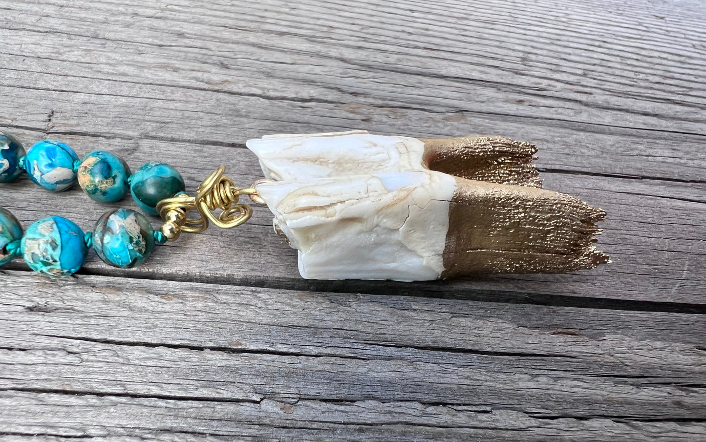 A-s-k and receive. Elk tooth pendant, brass wire, gold plated beads, jasper round beads, mala & bracelet. Elk tooth harvested from the forest after animal naturally died. Gratitude to the Earth for this exceptional life.