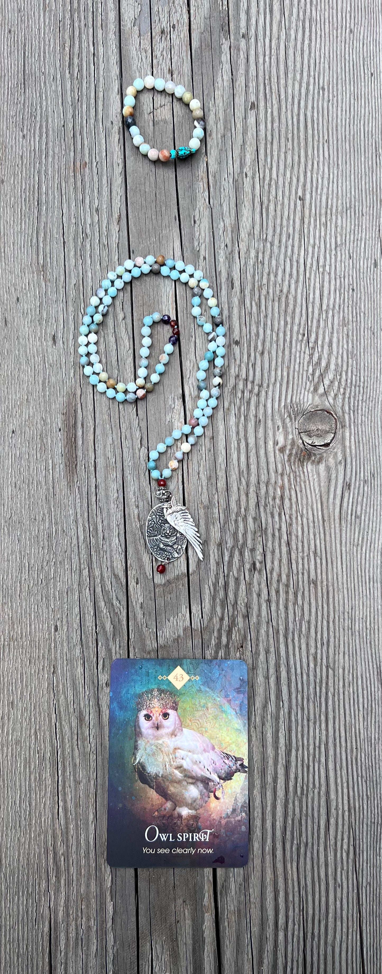 Mala, Amazonite with amethyst, carnelian, and garnet. Silver pendants. A tiger doesn’t lose sleep over the opinions of sheep