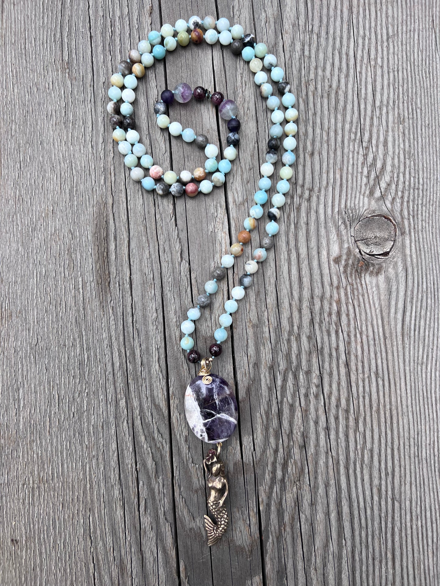 Mermaid spirit ~ 8 ~ infinity. Amazonite round beads with amethyst and garnet. Amethyst & brass mermaid pendant. Brass beads.