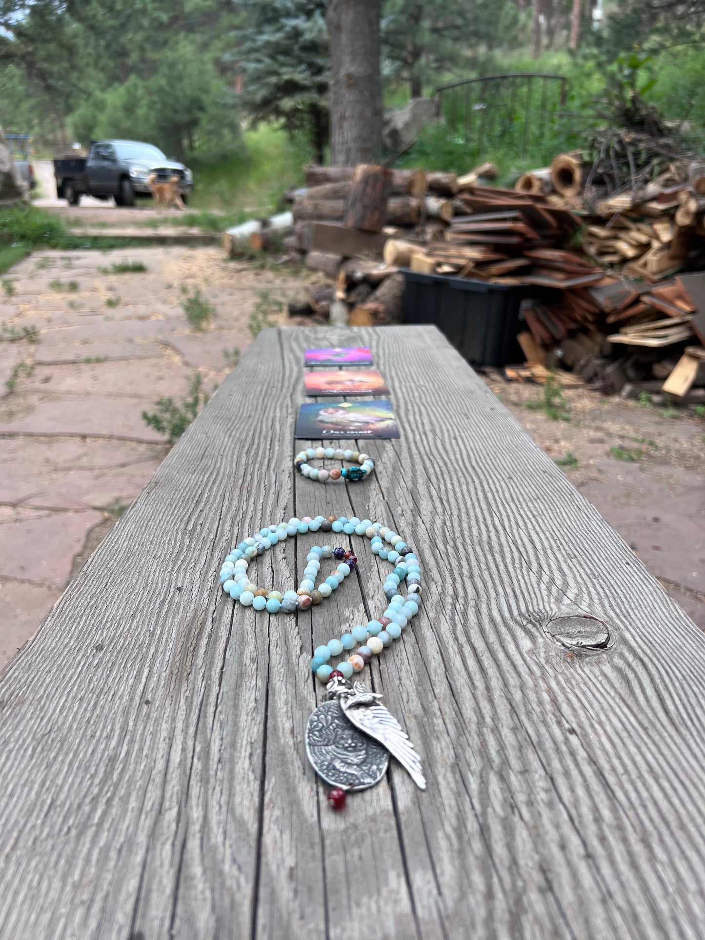 Mala, Amazonite with amethyst, carnelian, and garnet. Silver pendants. A tiger doesn’t lose sleep over the opinions of sheep